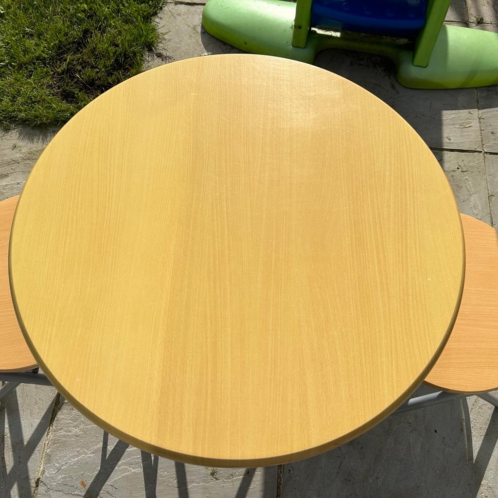 Bistro table 2 x chair set foldable indoor use only
#startfresh

Table diameter 69cm height approximately 80cm
Chairs are w36cm x l38cm
Slight scuff on side of table as shown in photo

Been used indoors only