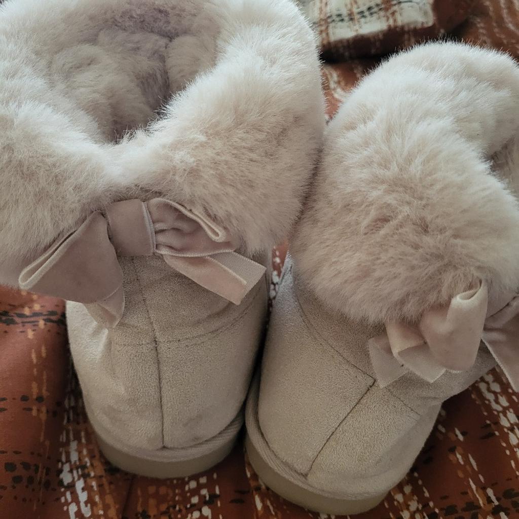 We have a lovely brand new pair of Slipper boots for sale (no box) size 5/6 just tried on but a little too big for me in excellent condition from smoke and pet free home collection only