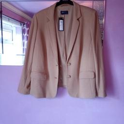 Camel colour, brand new with tags , spare buttons attached to tag ,very smart cotton blend ,fully lined ,2 pockets , Paid £55 last year but never worn .M&S smart jacket ,asking £20 