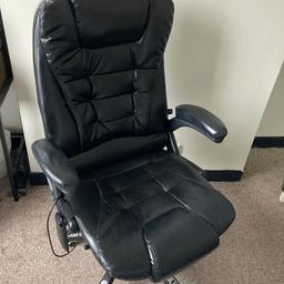 Faux leather office chair. Has recline button and plug in massage feature. Has some wear & tear but it’s a solid comfortable chair.