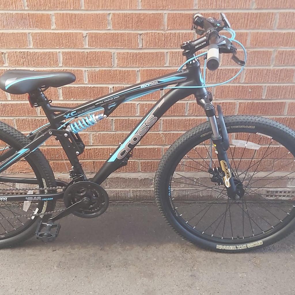 Cross DXT700 terrain mens 26inch mountain bike, vertical mounted shock, XC range shamans gears, 4 bar linkage, front and rear disc brakes, Zoom forks, 17inch frame. Small chip in paint ( see in photo). Still £275 in Argos. unwanted gift, never used! Collection only from Newport, Telford