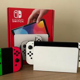 Oled switch comes with box all wires and an extra pair of joy cons no games with it.