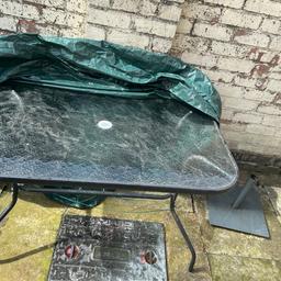 Good condition minus the slight signs of rust! Table has a cover that comes with it, parasol has always been kept inside so is in very good condition. No chairs.