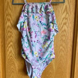 Purple / lilac swimsuit with pretty ruffle and crossover straps
Floral & butterfly print 
Age 6-8 years / 6-7 / 7-8
Fair condition, some slight staining from sun cream and slightly bobbled 

* PLEASE VIEW MY OTHER ITEMS - HAPPY TO COMBINE POSTAGE *

** FROM A SMOKE FREE HOME **