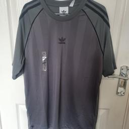 Genuine adidas t shirt , brand new with tags , small but could be a medium