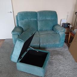 2 seater electric recliner with puffy storage the colour is teal very comfy couch