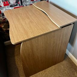 Wooden Desk with extra flap that opens for storage for stationary etc.

Measurements: length: 66cm

Width: 76cm

Height : 75cm
