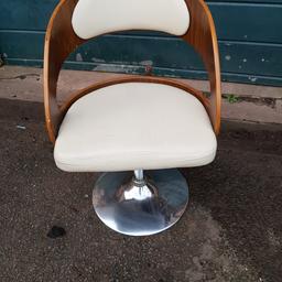 Wood and cream swivel chair good condition