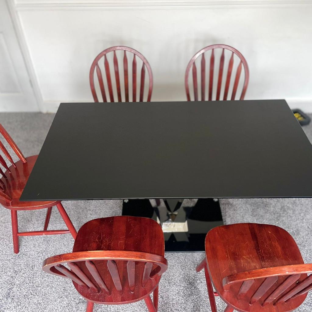 dining table with 5 chairs quite a heavy dining table just don't have space for it.
55" x 32"
 no returns