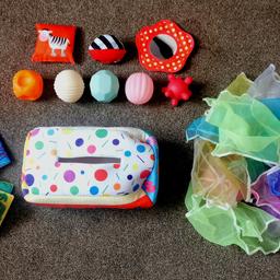 In excellent condition sensory toy's with a a variety of different items such as bean bag, balls, mirror etc. Perfect item to keep the little one occupied and it's great for their development