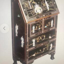 Beautiful Black High Gloss Lacquered wood with Pure Mother of Pearl embellishment on front & sides. Chinese writing bureau with drop down leaf & 2 large drawers & 2 small drawers. Due to size & weight collection Delivery van only, or if you’ve got big enough estate car? Tameside area. ONO £650.00 Have got 2 more to match, 1 tall octagon drawers & smaller 3 drawers, selling due to downsizing! Price will b given on other ones. No timewasters please! 