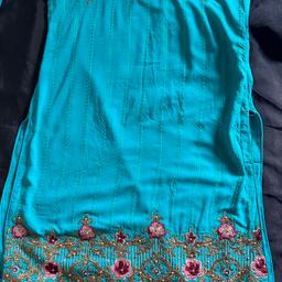 This a beautiful 2 piece ready-made shalwar kameez. It has got beautiful details on, both on the shalwar and kameez. I’m selling it due to the size. Perfect dress for summer!
