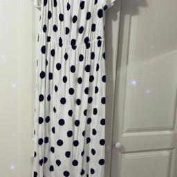 This is a beautiful dress bought from boohoo. Ideal for summer. Band new never worn.