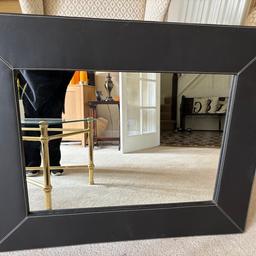 Large leather framed mirror 1m by 80cm
Slight markings to the side as shown by the photo