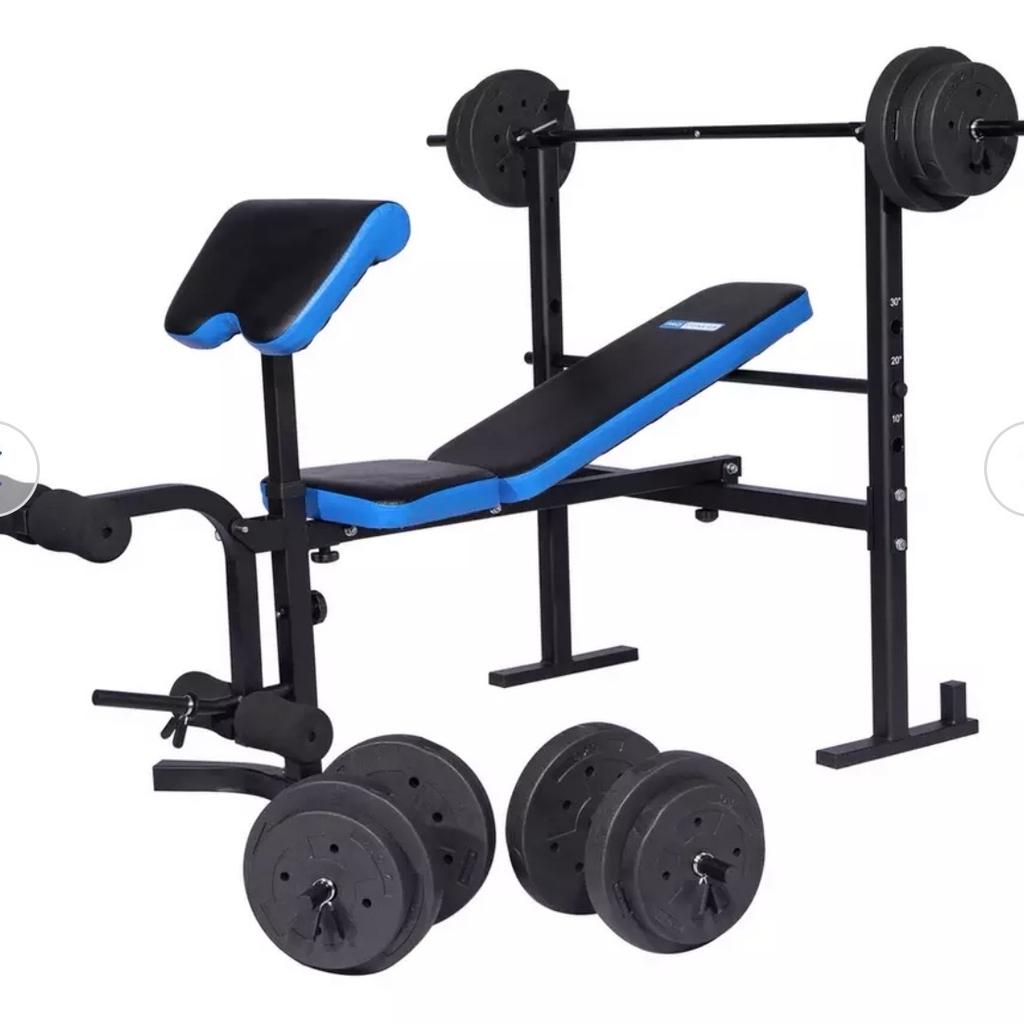 Hardly used, kept under cover outside weights are still boxed, not rusty, comes with bench/ bench press bar, leg curl attachment and dumbbells,
