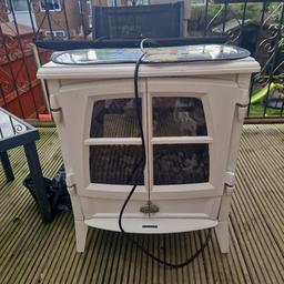 white electric fire.
heavy 
works fine 
no longer used been in storage for months. 
some scratches but general wear and tear.