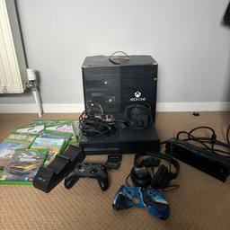 Xbox one with Kinect sensor
Comes boxed with leads
Controller 
2 rechargeable battery packs
Battery docking charger
Headset with adaptor
Minecraft
FIFA 17
Forza horizon 2
Forza horizon 4
Forza horizon 7
Rocket league
Terraria
Farming simulator 17
Car mechanic simulator
Good condition all works as it should