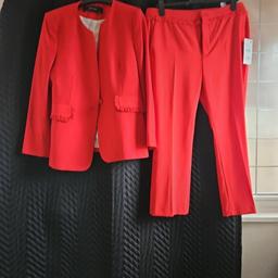 Zara Red trousers suit.
Fullylined Jacket
Trousers has 2 side pockets