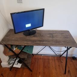 Brown and Black desk for sale

Bought brand new 18 months ago, in great condition, only selling as I am moving into a furnished flat. 

Willing to sell for cheaper if you can pick up this weekend.