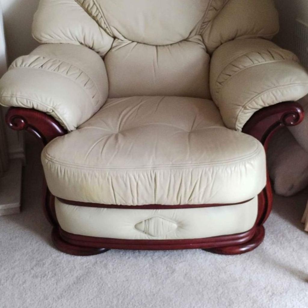 Beautiful Genuine Cream Leather Sofa and Two Arm Chairs, very luxurious and comfortable. This is a high quality leather suite with dark walnut wood frame trim. This was purchased from a reputable leather furniture design company. It has had limited use, It's a very heavy well designed piece of furniture. Measurements upon request. Genuine enquiries only, Purchaser would need to arrange collection/transport. CASH ON COLLECTION OR BANK TRANSFER ONLY IF GENUINE.