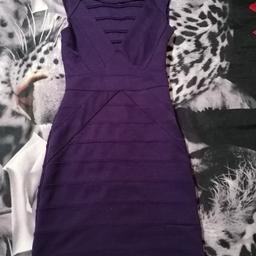 New women's dress. The colour is dark purple. The size is EUR 34, UK 6, US 2. The brand is TOPSHOP PETITE. Contact phone 07519409457 Eva.