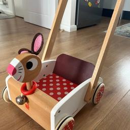 It’s a great wooden baby walker very practical and great quality. I bought it from John Lewis.