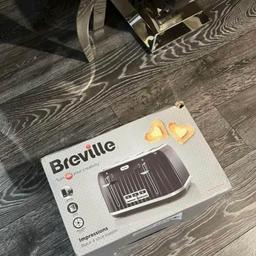 Breville toaster 
Used once 
Too big 
Come with box 
Collection Bradford 
Local delivery available