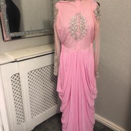 This is a tailor made dress
Listing is for dress only
This is the link to the you tube video of this item
https://youtube.com/shorts/bbtD7CiYMRM?si=R4a4ReInkZZDJtGJ
Suitable for Indian/Asian/Pakistani party wear
Would suit ladies size 4-6 or a teenager
Please see measurements below
Colour pink
Waterfall drape design
Rhinestone detail front and back - please note some stones/beadwork could be missing here and there or lose
Long sheer sleeves with beautiful rhinestone/beadwork
Zip fastening at back
Hook and eye fastening at back
Faint yellow stains hardly see when it’s on
A rip and fabric snag to the drape waist area
Stitches undone at one side waist area
Probably an easy fix for someone who knows how to do it
Used condition
As it’s a long dress there is black marks at the bottom of the dress but you can hardly tell when it’s on
Measurements - all Approx
Length 134cm
Shoulder 37cm
Armpit to armpit 41cm
Waist 36.5cm
Sleeves length 57cm
Armhole 17cm
I have another dress exactly like design