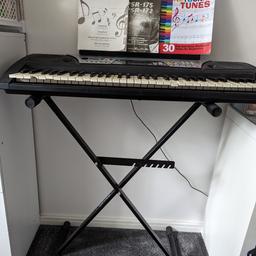 Sold as seen - damage to some of the keys but still works. With some careful gluing you possibly couldn't tell.
Comes with instruction book and an easy music book.
Adjustable stand included too.
Cash on collection only from Rochdale OL11....no PayPal courier scams!