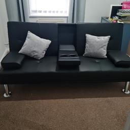 Black double bed settee.
used once in spare room.
excellent condition.
Cup holders.