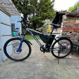Falcon e-bike with the 250W rear motor,and 3 levels of assistance Key Features: Battery 10 ah 36 V,Mechanical disc brakes,Rear Hub,Frame:19” Alloy,Suspension forks 35 mm Travel,Wheels:26”Alloy disc Rims-Double Walled,Gearing:6 Speed Shimano Extras:Kickstand,Mudguards,Battery Range:Up to 40 Miles.