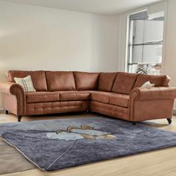 Title: Suede Leather 2C2 Corner Sofa 
Corner Suite 
Color: Black /Brown 
Dimensions: Length: 210.0 cm
Width: 210.0 cm
Height: 90.0 cm 
Condition: Band new  
Viewing recommended
Delivery Available
