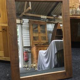 Large solid wood custom made wall mirror in as new condition. A really heavy piece made to a high standard. It has been set up to hang portrait but can easily be changed if needed. All fixings are present. Measuring 79cm wide x 110cm tall. Collection is Leeds LS24 & delivery is available if required - £80