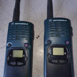 motorola walkie-talkie Handiepro with 4 batteries and 2 chargers. batteries charged needs regularly charging.