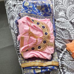 New Asian suit with salwaar and chunni.size 12/14 pink suit and blue designed pants with gold design. beautiful pattern. collection only
