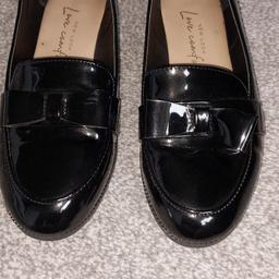 New look love Comfort shoes. Black patent with bow on the front. size 5. Have been worn a few times.