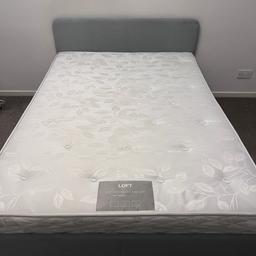 Standard double bed and mattress set, with comfortable medium-firm matress included. The frame is constructed of wood and steel and upholstered in a stylish grey fabric.

Headboard is 85cm high, footboard is 40cm high, the width is 139cm and the length is 196cm