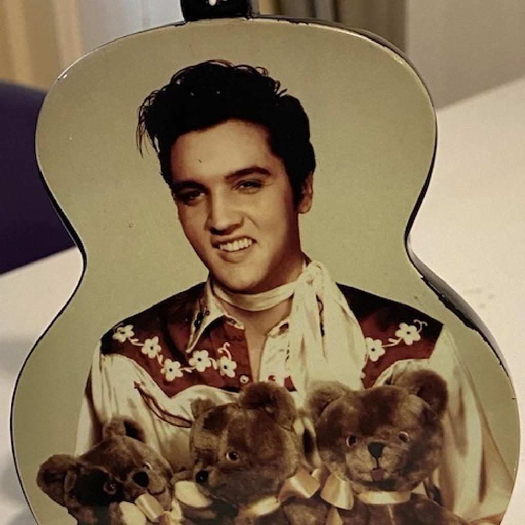 RARE TO FIND THIS IN THE UK IN THIS CONDITION
A freestanding guitar ornament - official release.
This is in stunning condition just one small mark. Works fully and plays the tune of 'Teddy Bear' when wound up.
23cm high x 10cm wide
I have sold over 3500 Elvis items (!) with a positive feedback score of 100% so you are in safe hands!
And as my regular customers know I only post the highest quality items. So yes may cost more but you have guarantee of quality from a specialist Elvis seller. Please feel free to visit my page and read reviews.
I also have the largest number of Elvis items for sale. The spectrum includes…..DVDs, CDs, VHS, tapes, records, magazines, books, rare concert CDs….and MANY MORE RARE ITEMS…..AND MORE!!
Be quick and good luck!
REF: 10