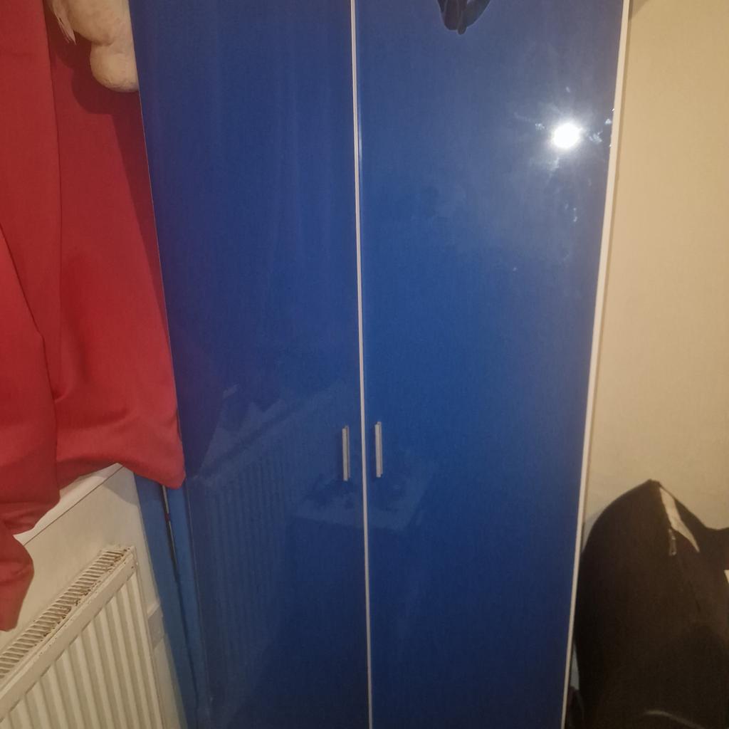 Single Cabin bed with storage. Matching blue wardrobe and bedside drawers. Has spiderman stickers that can be removed. One small imoerfection on the bed which does not affect use. 100 ono for all 3. Need gone asap