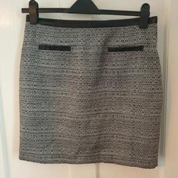 Womens Pencil Skirt, size 12.
Grey with black pattern leather effect waistband and pocket effect. Zip up back.
Excellent condition, hardly worn. 

Safe collection available or delivery can be arranged for a small charge
Shipped within 24hrs if using Royal Mail or Yodel.