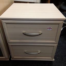 This two-drawer good quality bedside cabinet is on really good runners but does have a small bit of damage on the corner edge...

Small set - 18 inches wide x 16 inches deep x 21 inches high.

Our second hand furniture mill shop is LOW COST MOVES, at St Paul's trading estate, Copley Mill, off Huddersfield Road, Stalybridge SK15 3DN...Delivery available for an extra charge.

There are some large metal gates next to St Paul's church... Go through them, bear immediate left and we are at the bottom of the slope, up from the red steps... 

If you are interested in this or any other item, please contact me on 07734 330574, or on the shop 0161 879 9365...Many thanks, Helen.

We are normally OPEN Monday to Friday from 10 am - 5 pm and Saturday 10 am -  3.30 pm.. CLOSED Sundays. CLOSED Bank Holiday long weekends...