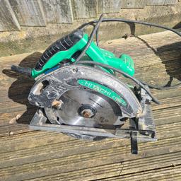 Hitachi circular saw , very powerful circular saw, no longer needed grab a bargain come with work bench