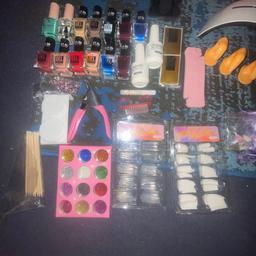 13 coloured gels, top coat and foudation coat gel, nail glue, 3 nail praciticees, full pack of glitter, drill with all 5 different ends plus drill case, 2 packs clear and white nail tips, USB port nail uv lamp, 3 mini acrylic powders 2 white 1 pink, 3 bigger acrylic powders pink, white, clear, mini acrylic liquid glass, nail clip, nail brush, separators, nail guides, YES USED but ALL is in good condition for practise use ! Needs gone! (If not wanting all can negoitiate price for certain products wanted)