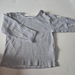 Baby striped long sleeved top with 2 buttons on the shoulder. 
Worn but outgrown