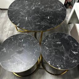 This beautiful set of 3 marble effect black and gold coffee table Dimmensions are 90x90x44cm and 45x45x39cm. 

Grab a bargain while available!!