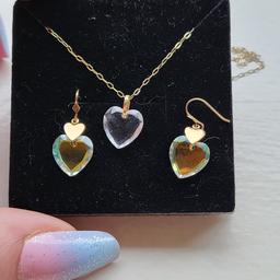 brand new 9ct gold heart necklace and earrings set postage to be covered if needed plz thanks