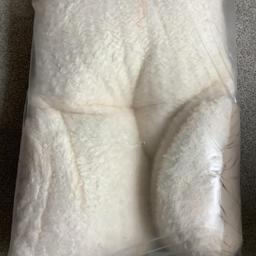 Deluxe fleece back and side support pillow. Brand new and never been opened. Please look at my other items for sale. Listed on other sites.