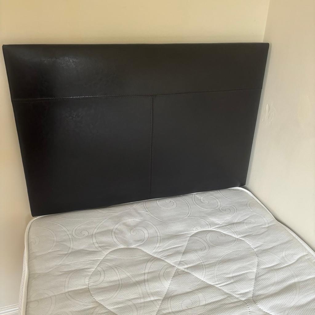 3ft single bed with storage in base. Comes with leather brown headboard. Virtually new.