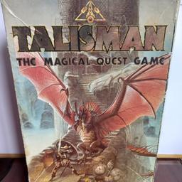 Rare and vintage Talisman The Magical Quest Game, Second Edition. Made by Games Workshop in 1985.
Talisman 2nd edition board game comes complete apart from missing 3 counters (1 missing green live number 1 counter, 1 missing craft blue number 3 counter and 1 missing gold yellow counter). Supposed to be 140 in total. 137 are present.
Other than that the game comes fully complete. Supposed to be 1 dice but I have provided 2 dice. Wear tear to outer box. Game in good condition.