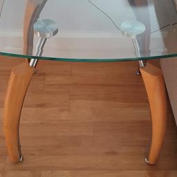side table with wooden legs in very good condition.